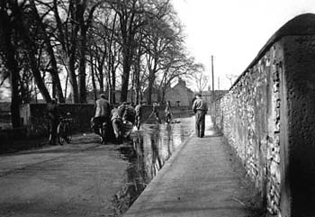 From outside Haddlesey House towards The Gables. My mother, Rhoda Goodrum (nee Davison) is wheeling the bike